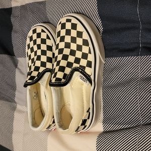 Vans black and white checkerboard slip-ons